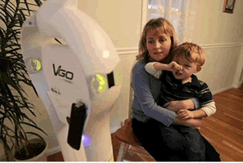 Erin Tally and son Aidan speak with doctors at Children's Hospital Boston via VGo