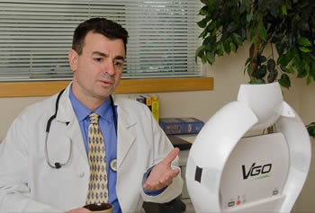 doctor remotely monitoring a patient with VGo robotic telepresence