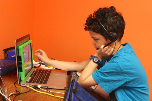 Gabriel controls the VGo remotely from his home.